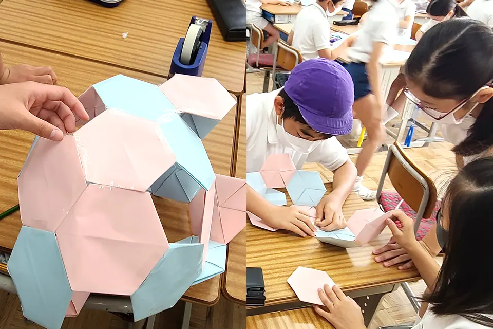 研究発表する教師